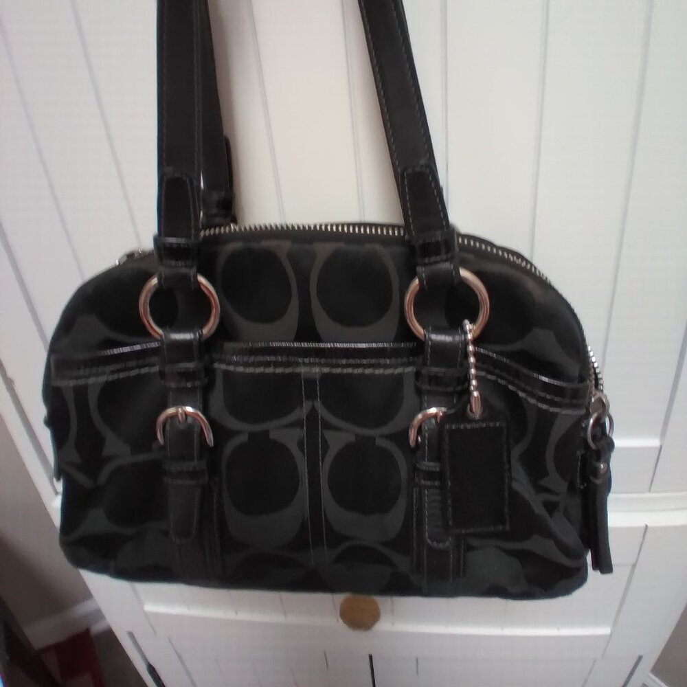 Black canvas with leather trim Coach purse